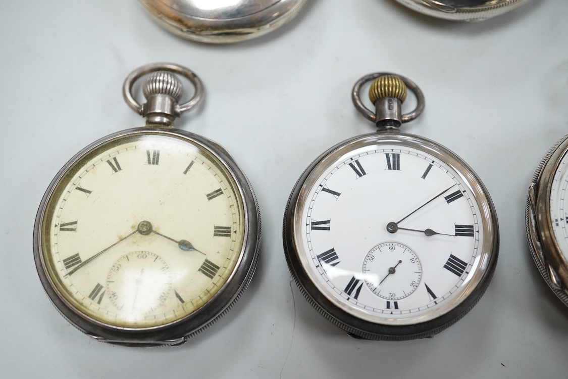 Seven assorted mainly early 20th century silver open faced pocket watches including a chronograph by William Williams of Bury, case diameter 53mm and one other silver pocket watch case(no movement).